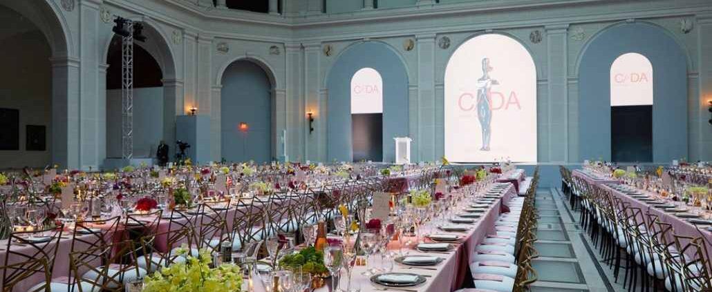 Pink and white themed tables at an event